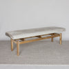 angled view of the cream coloured cowhide on top of a ottoman bench by corcovado