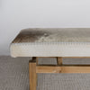 close up of the end of the cowhide bench seat in cream and grey tones from corcovado