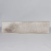 full length view of the top side of the creamy cowhide entrance bench seat