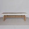 front view of a creamy cowhide entrance bench seat