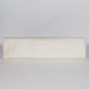 full front view of a cream coloured narrow cowhide bench seat for an entrance of end of bed bench