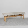 angled view of a creamy grey coloured cowhide bench seat from corcovado