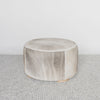 grey and cream round cowhide ottoman coffee table