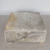 top down view of an extra large grey coloured square cowhide ottoman coffee table