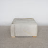 cream light coloured sqarae cowhide ottoman coffee table