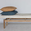 the grey and cream coloured cowhide bench seat ottoman from Corcovado with 2 cushions at one end