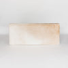 full front view of a a caramel earthy coloured cowhide bench seat