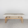 front voew of a light coloured cream cowhide bench seat from corcovado