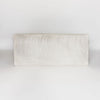 top down view of a light coloured cream cowhide bench seat from corcovado