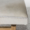 close up of the cowhide bench seat in light cream tones by corcovado