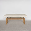 front view of the cream coloured cowhide bench seat ottoman