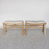 set of two small light coloured cowhide bench seats