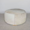 cream and grey cowhide round ottoman from corcovado