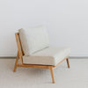 angled view of an oversized teak wood armless chair by Corcovado