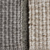 close up of the grey and neutral coloured sand coloured PET recyceld yarn floor rug