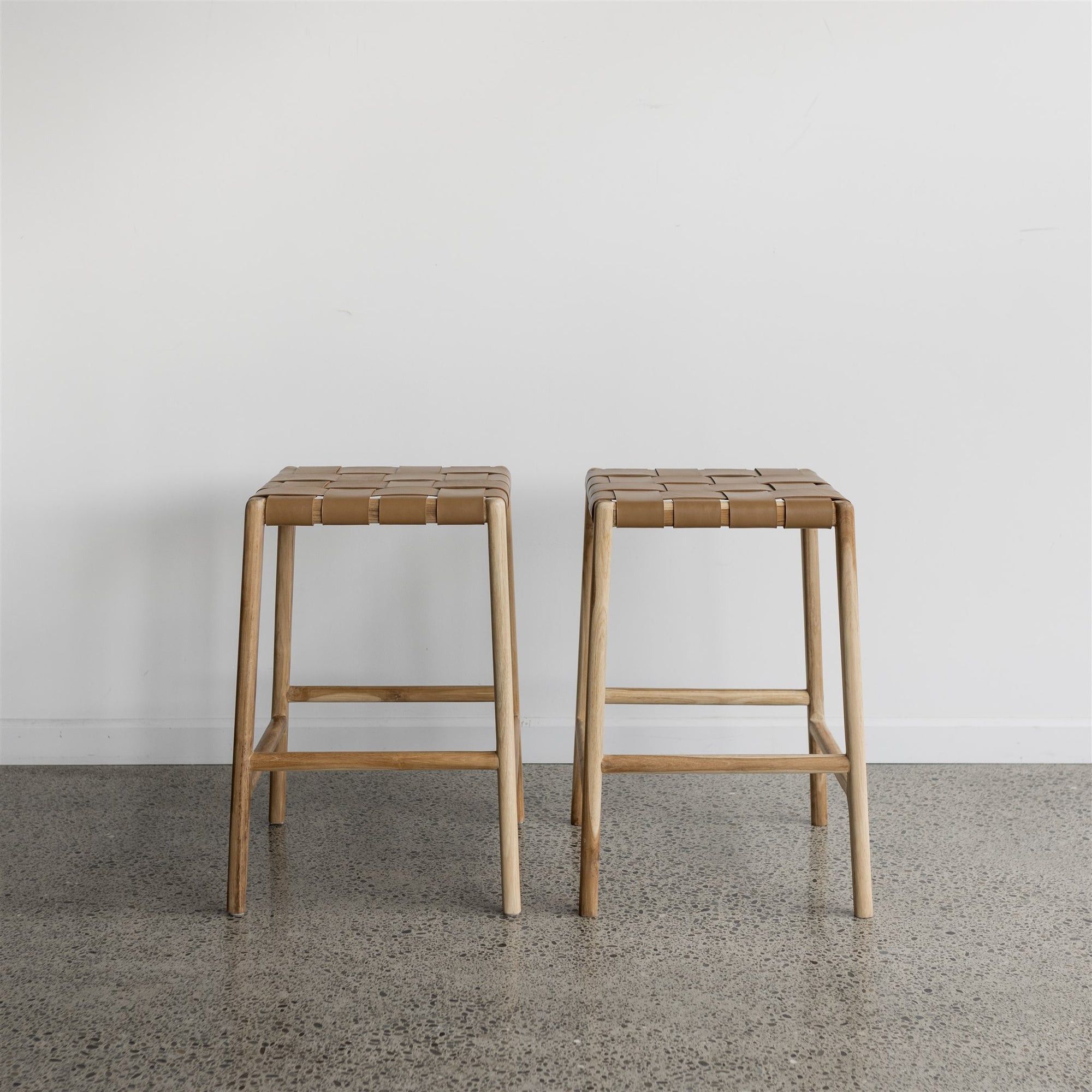 tan leather bar stool shown as a set of two 