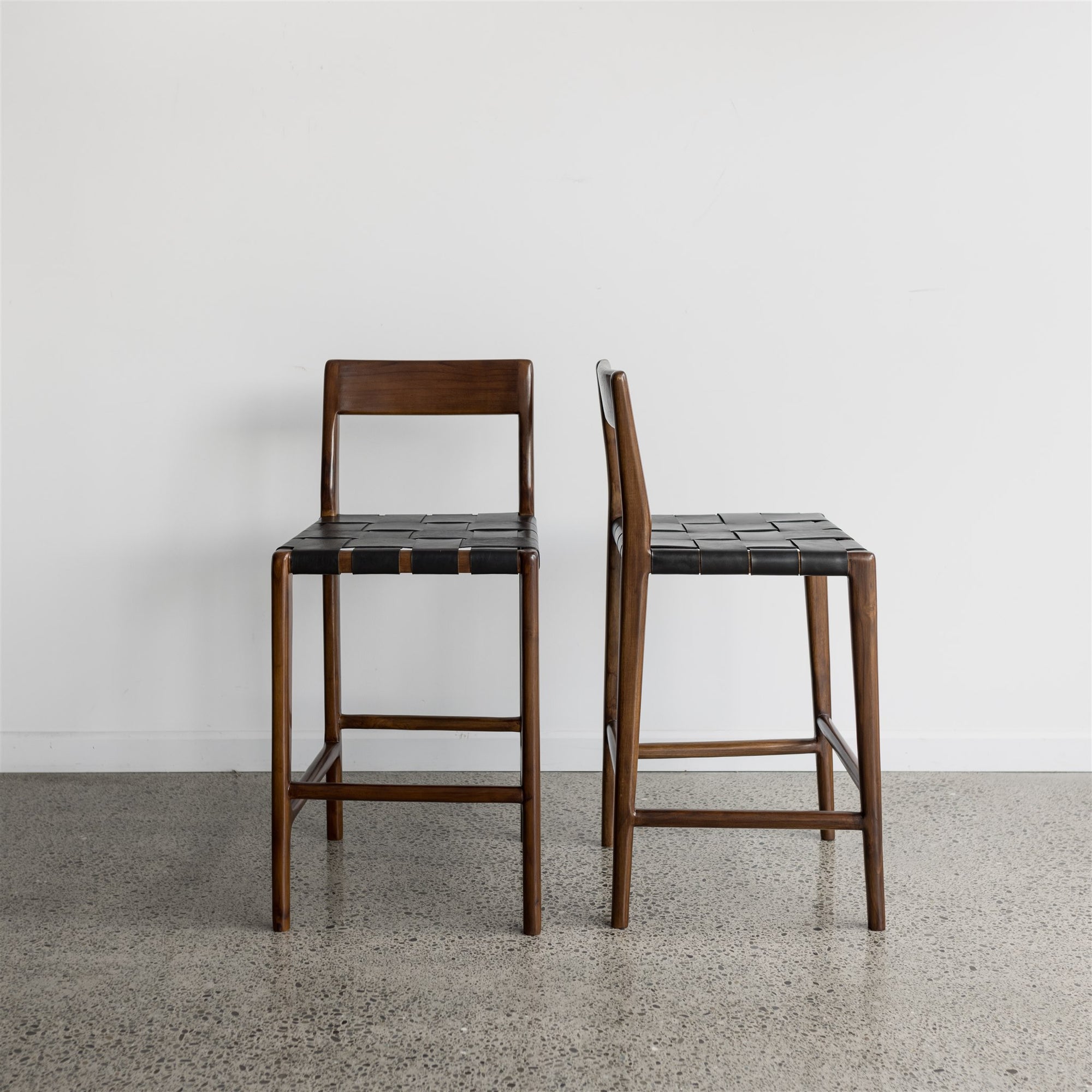 serengeti bar stool with black woven leather seat and dark brown wood 