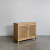 angled view of the teak wood buffet cabinet for living room spaces