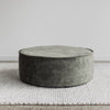 round ottoman in green velvet