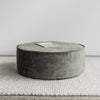 round ottoman in green velvet