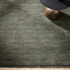 forest green wool floor rug with small fringing detail from corcovado